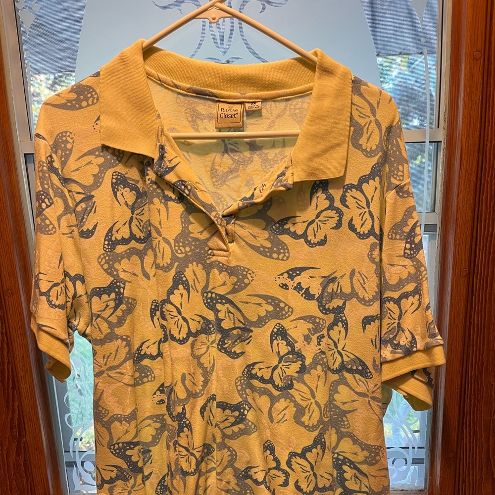 3 patterned short sleeve polo shirts.